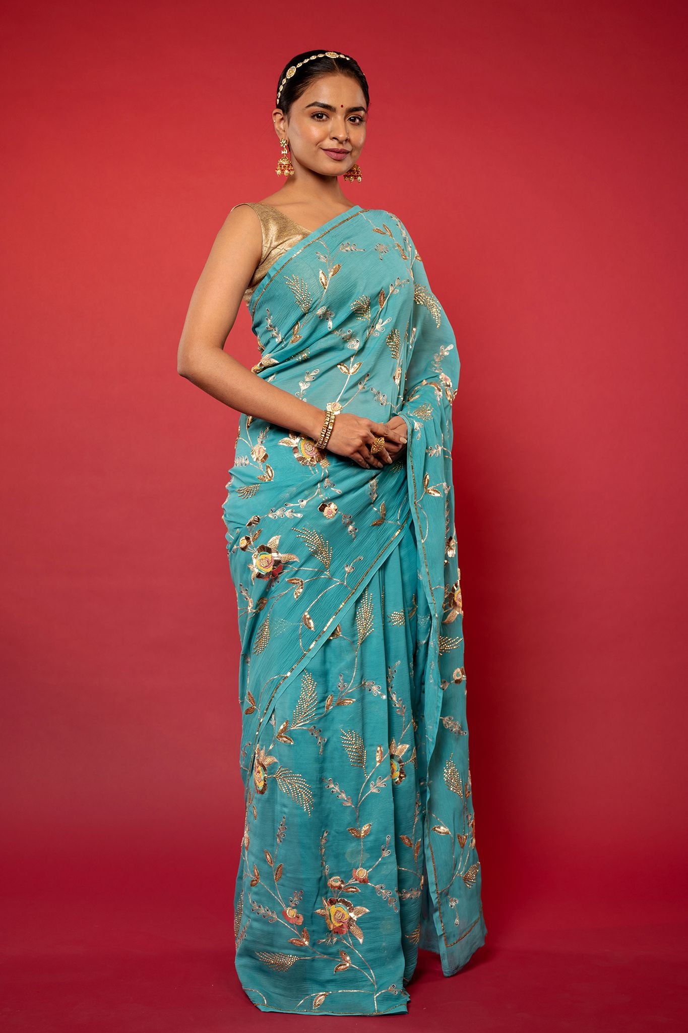 Turquoise pure chiffon aari sequins jaal handwork saree
