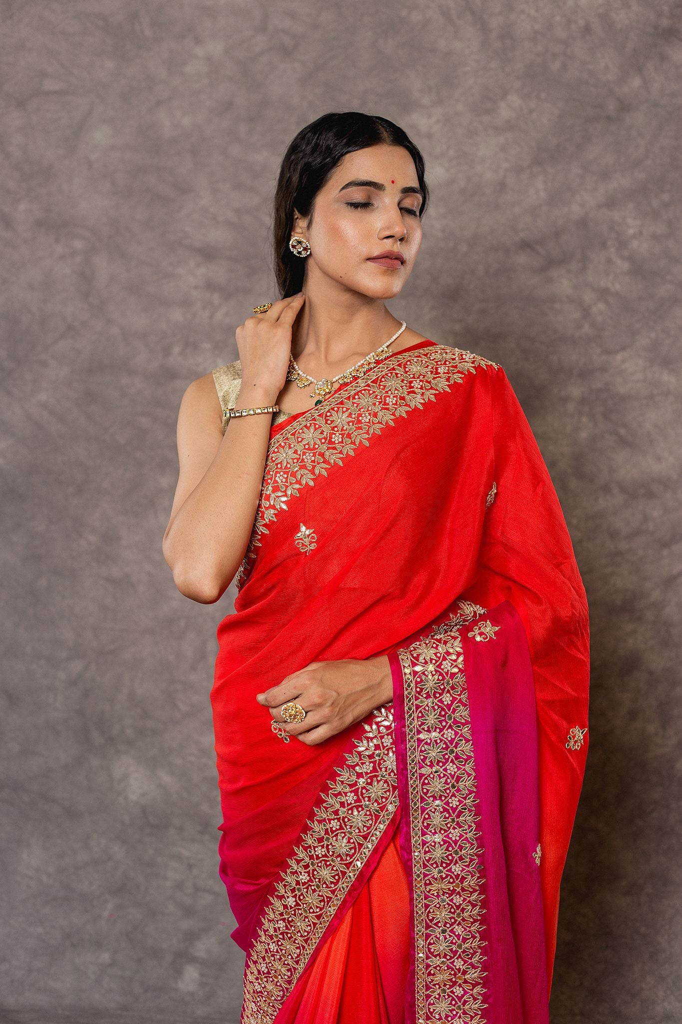 Rani orange pure chinnon chiffon gota pati border butti handwork saree