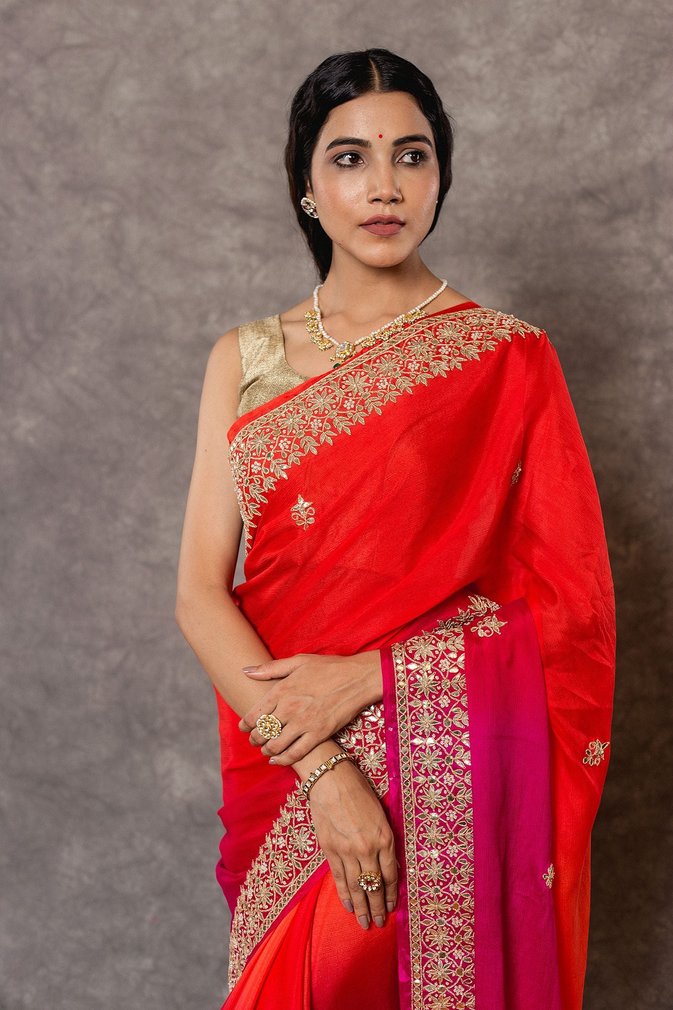 Rani orange pure chinnon chiffon gota pati border butti handwork saree
