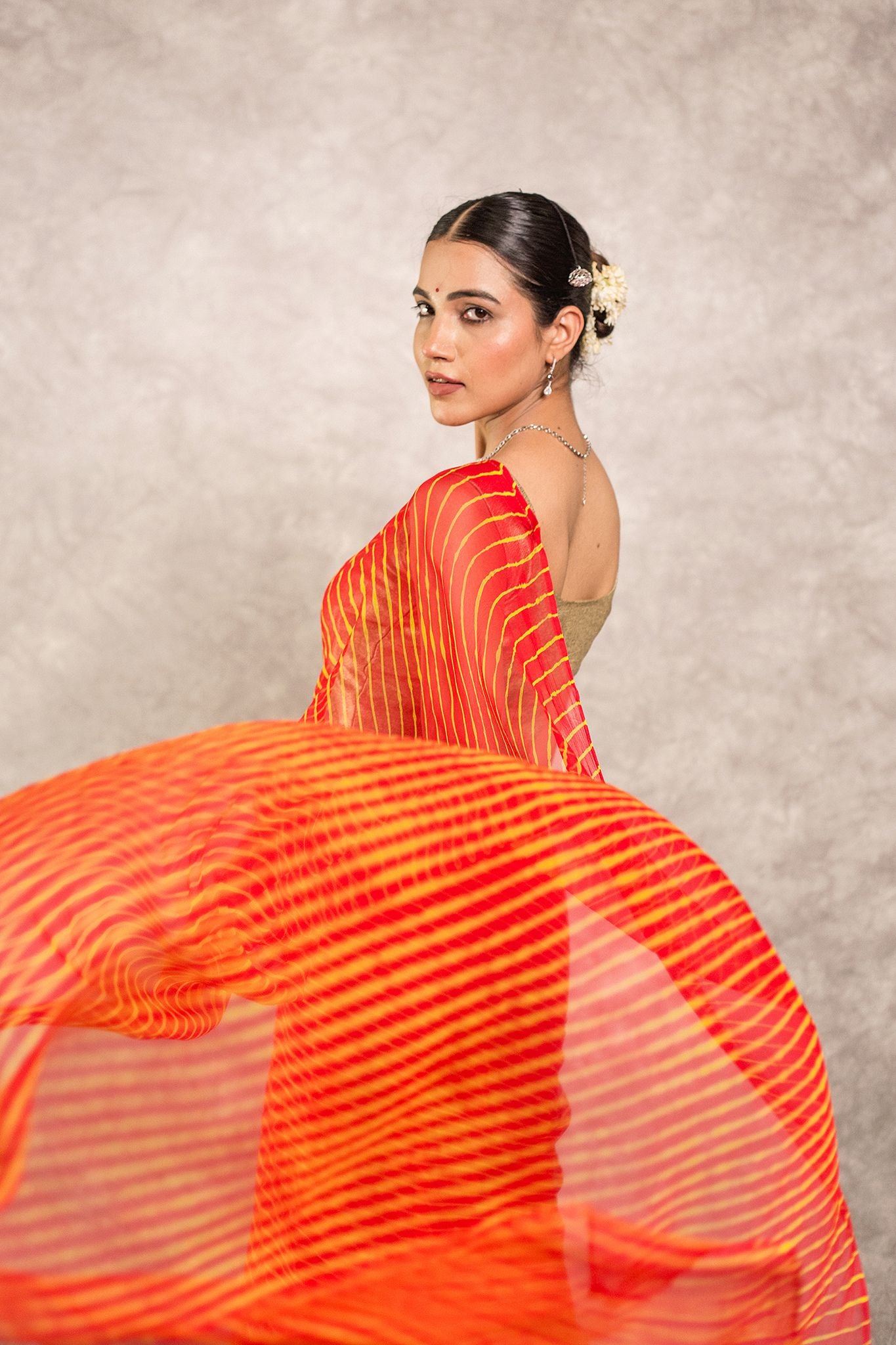 Orange lehariya Pure Georgette 20 Gsm plain hand dyed traditional wear saree