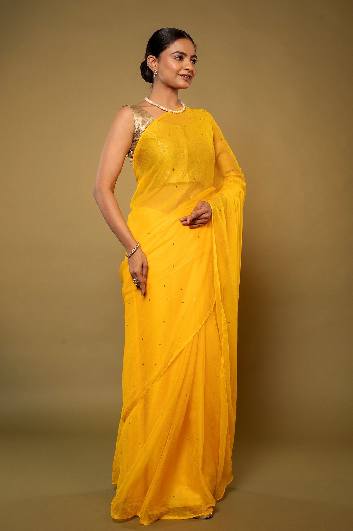 Yellow viscose chiffon Ringmukesh handwork casual wear saree