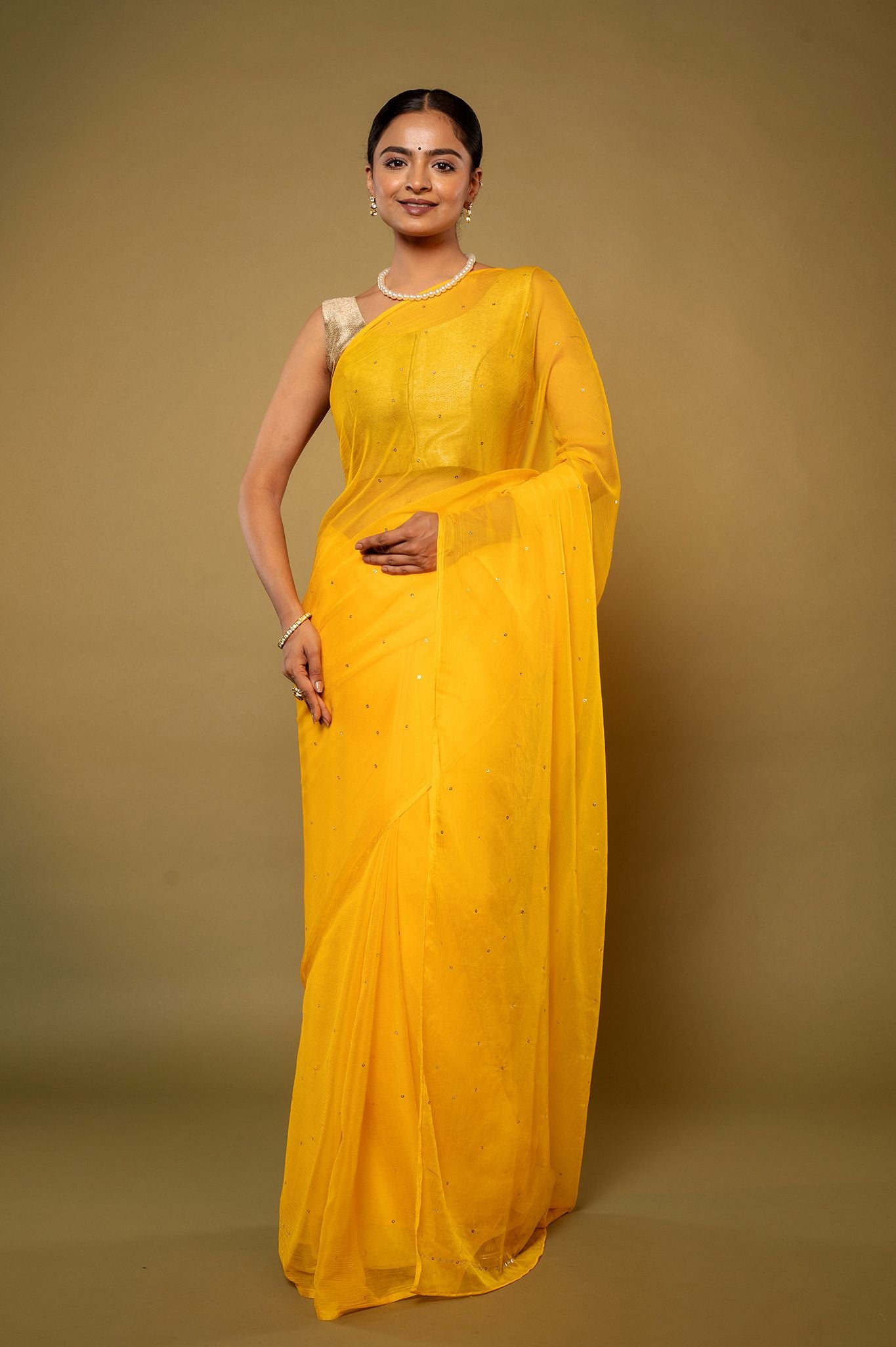 Yellow viscose chiffon Ringmukesh handwork casual wear saree