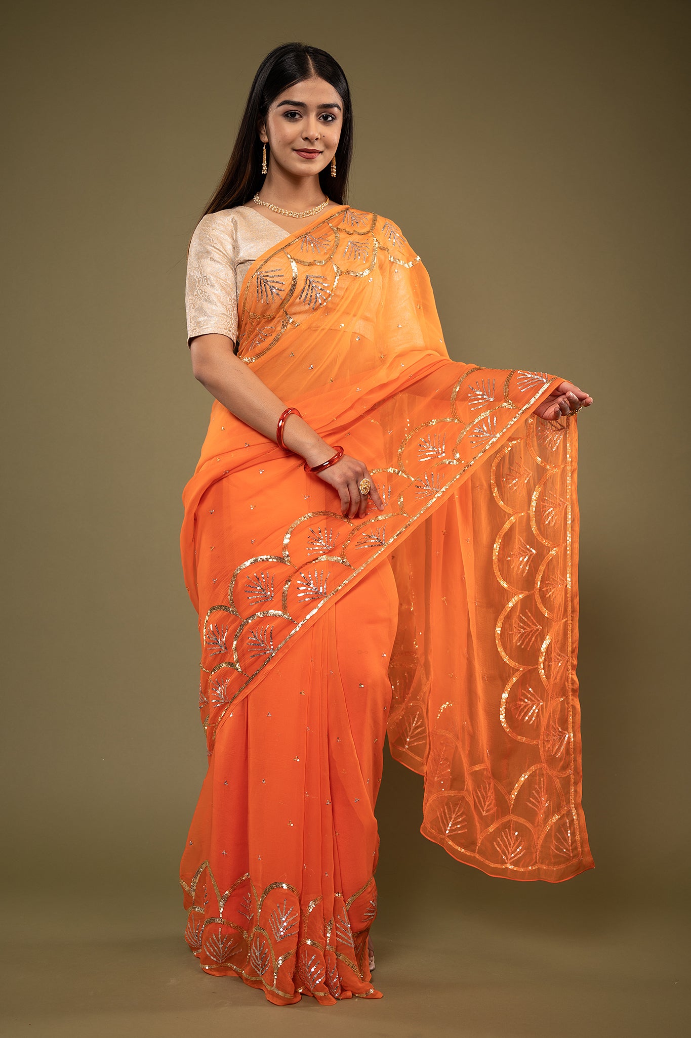 Orange viscose chiffon sequins border butti handwork casual wear saree