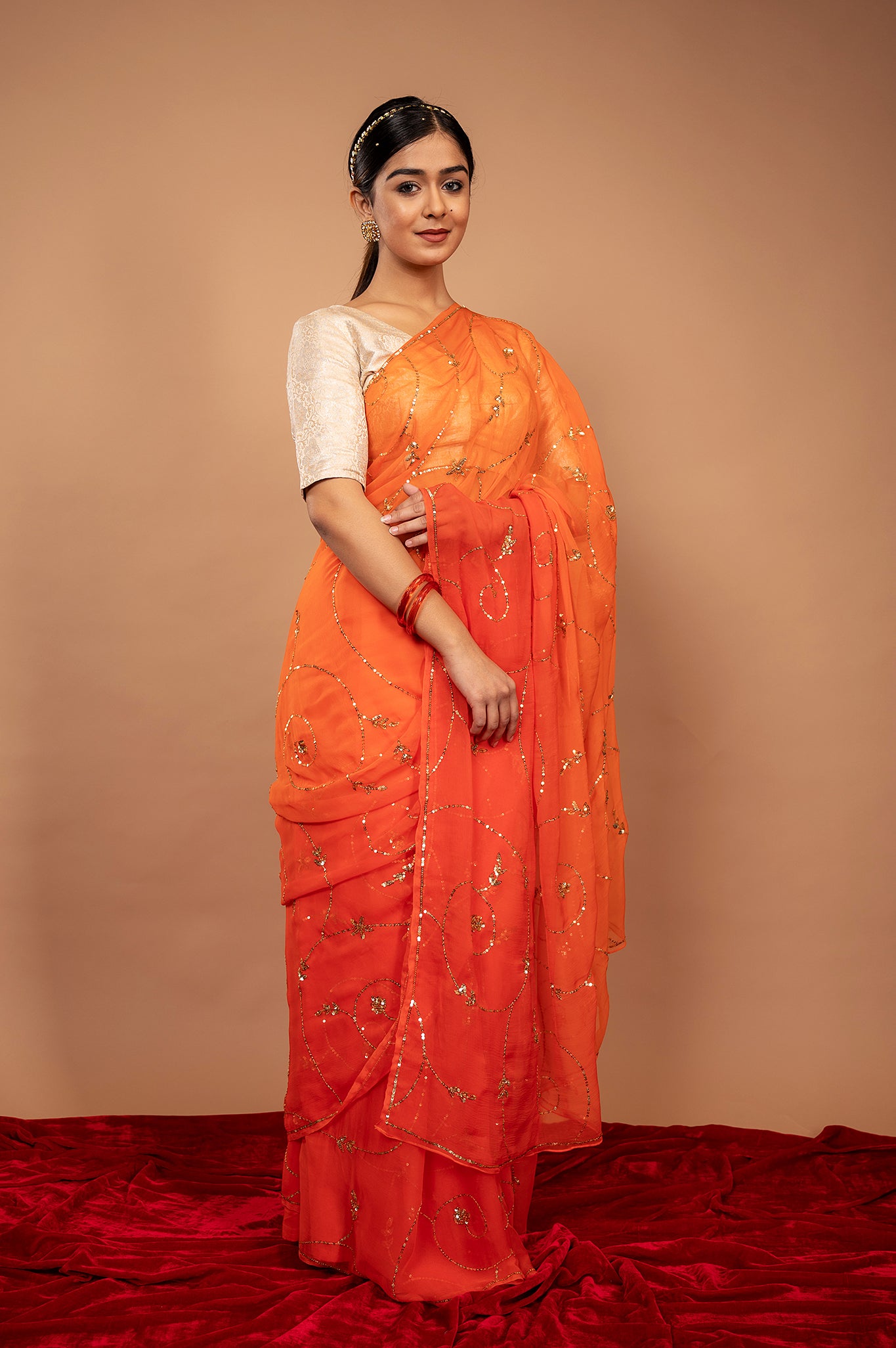 Orange viscose chiffon Sequins jaal handwork casual wear saree