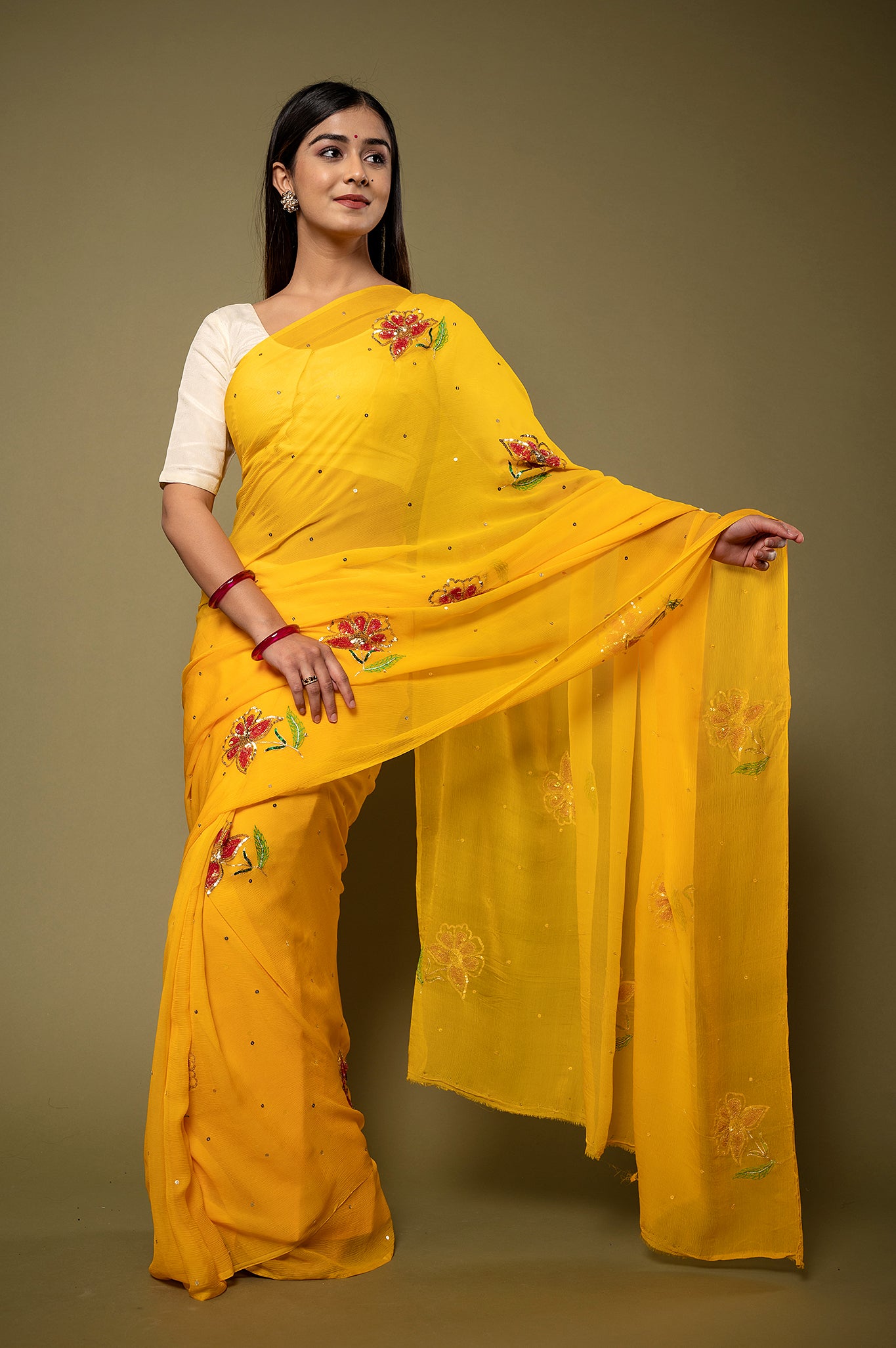 Yellow viscose chiffon sequins resham motif handwork party wear saree