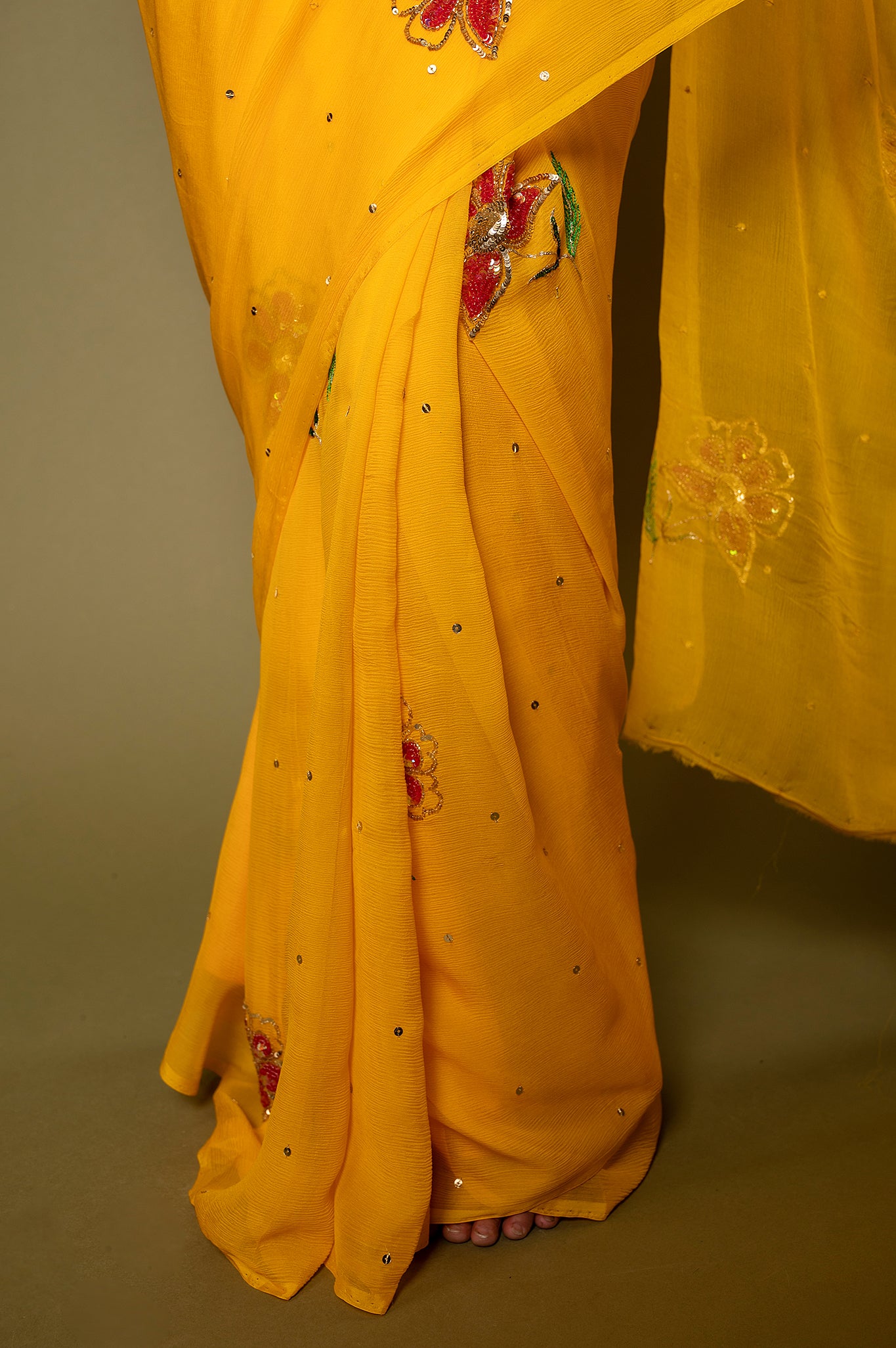 Yellow viscose chiffon sequins resham motif handwork party wear saree