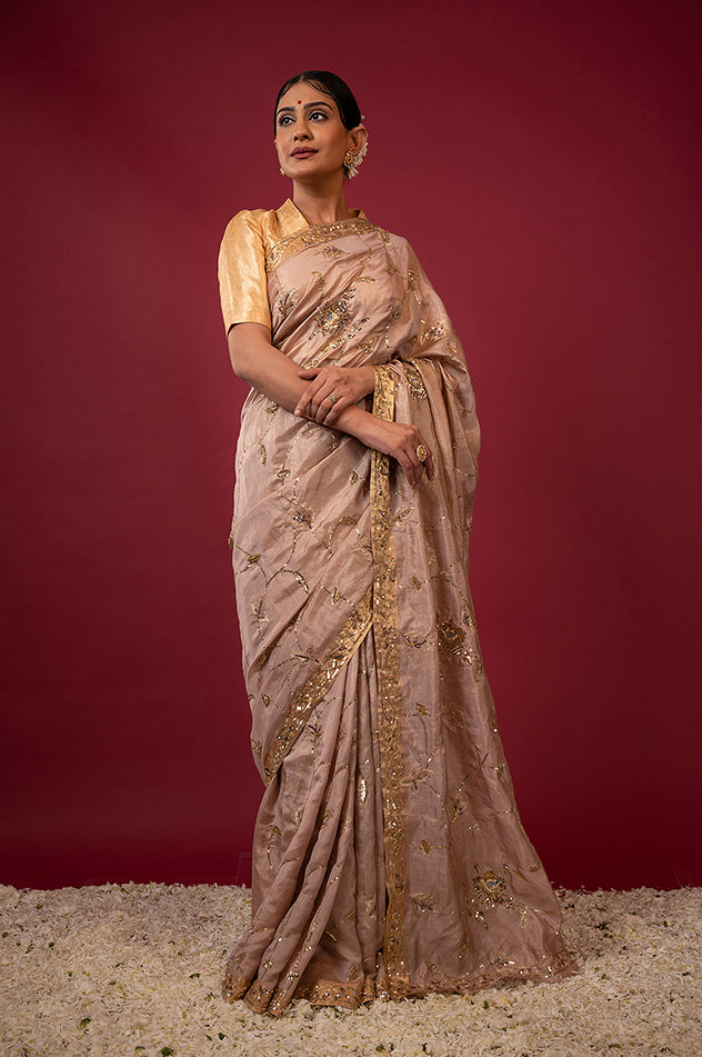 Soft peach pure tissue aari sequins jaal handwork saree