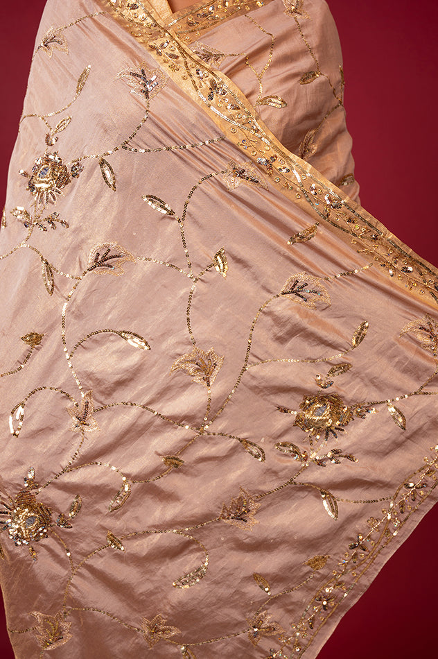 Soft peach pure tissue aari sequins jaal handwork saree