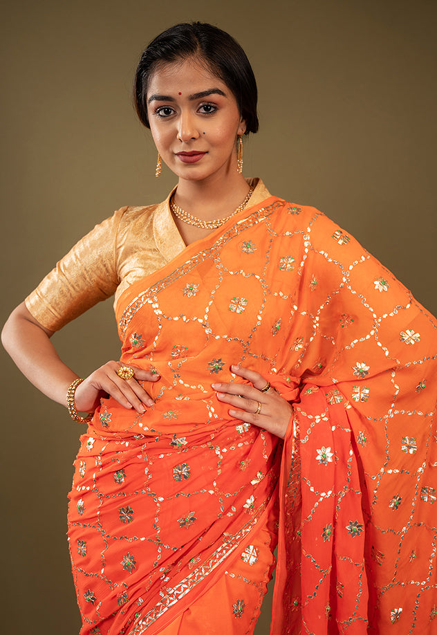 Orange light dark pure chiffon gota patti jaal handwork saree