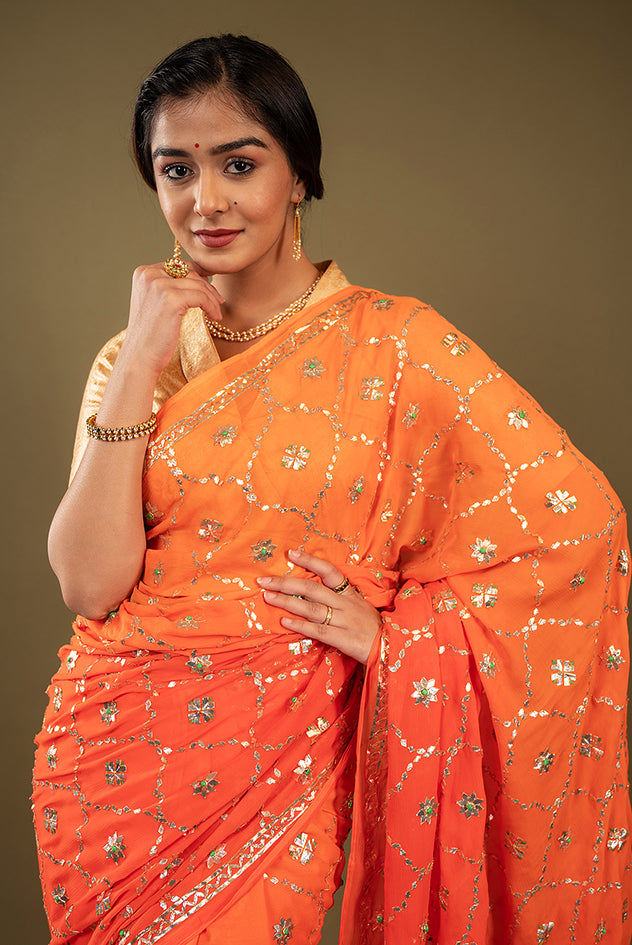 Orange light dark pure chiffon gota patti jaal handwork saree