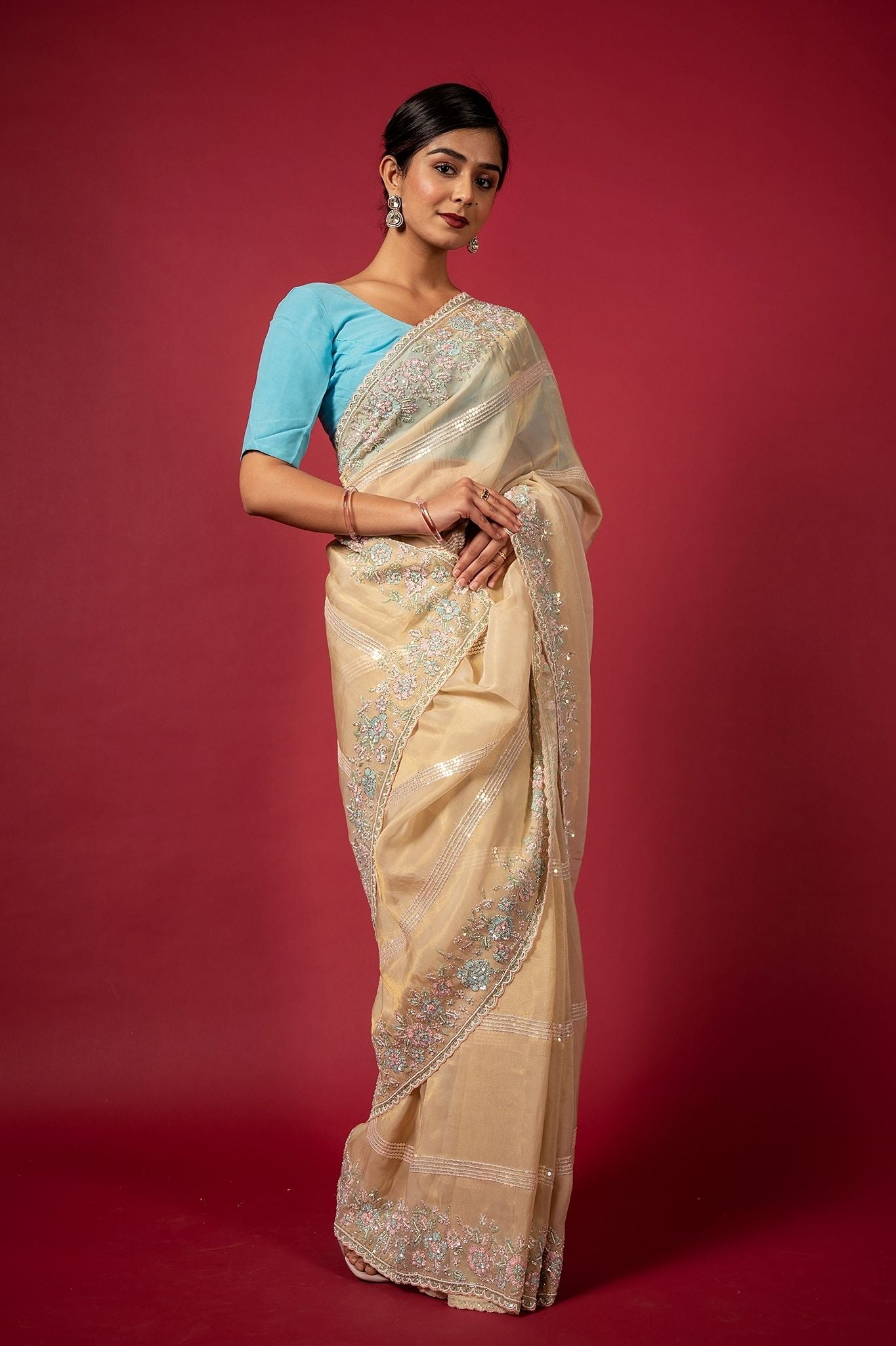 Cream organza  preal sequins fancy work handwork saree