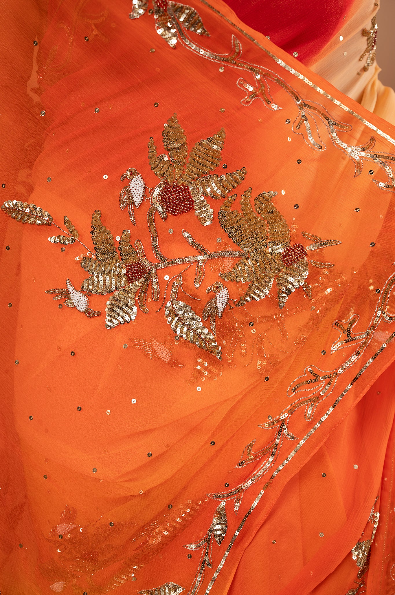 Yellow orange Pure Chiffon Aari sequins  Motif handwork saree