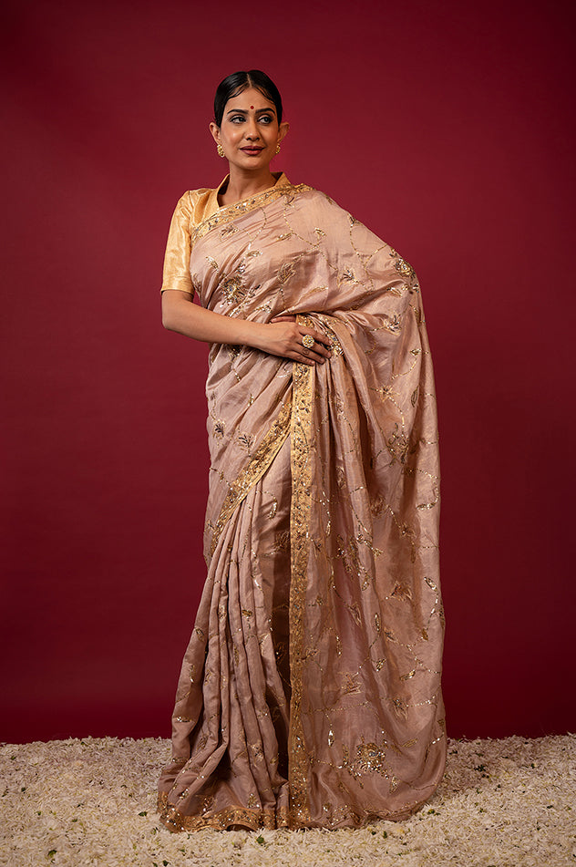 Soft peach pure tissue aari sequins jaal handwork saree